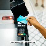 SOCIAL IMAGE PARTNER OFFERS TERMS APPLY Close up of person paying with credit card at store Jordi Salas 6